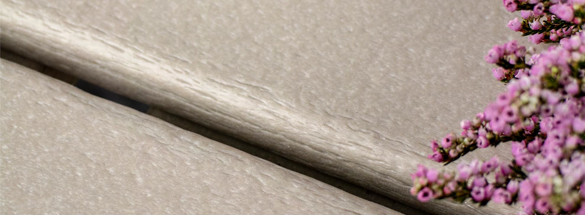 Closeup of POLYWOOD classic finish lumber in Sand